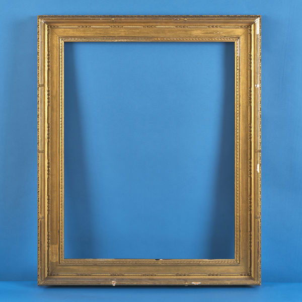 Raeburn neo-classical portrait frame, early 19th century gilded compo frame; bound bunched reed top; beed and bobbin at foot of hollow; tongue front edge and egg and dart back edge rebate size: 32.375 x 25.375 inches sight size: 32.375 x 25.375 inches width: 3.875 inches
