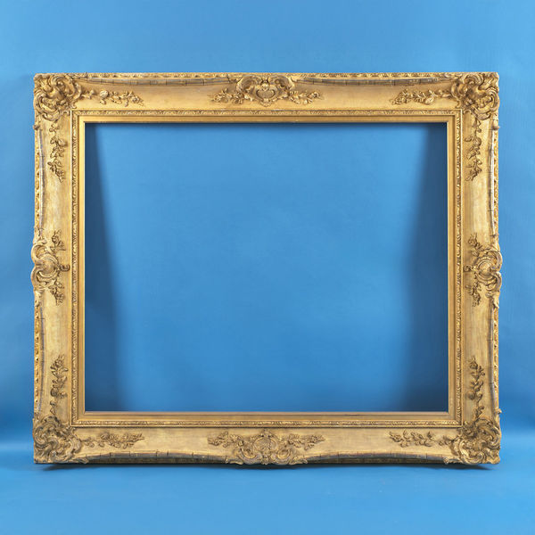 Swept portrait frame, early 20th century maker's label for Doig, Wilson & Wheatley gilt compo swept; corners and centres with foliate swags; net ground; slip rebate size: 40.25 x 50.25 inches sight size: 39.375 x 49.375 inches width: 6.375 inches