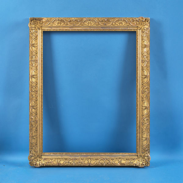 Scottish frame, early 20th century gilt compo straight sided; coverground on cross-hatched ground; Louis XIV revival with flowers, acanthus leaf and strapwork running pattern; corners with c-scrolls and rosettes on spotted ground; demi-flower and leaf sight edge; turned leaf and pearl back edge rebate size: 39.625 x 30.625 inches sight size: 39 x 29.875 inches width: 4.25 inches
