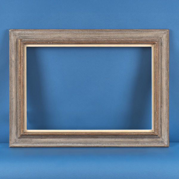 French painted frame, 20th century gesso; reverse profile; painted grey over red-brown; scratched surface design; slip rebate size: 16.25 x 24.25 inches sight size: 15.75 x 23.5 inches width: 3.25 inches