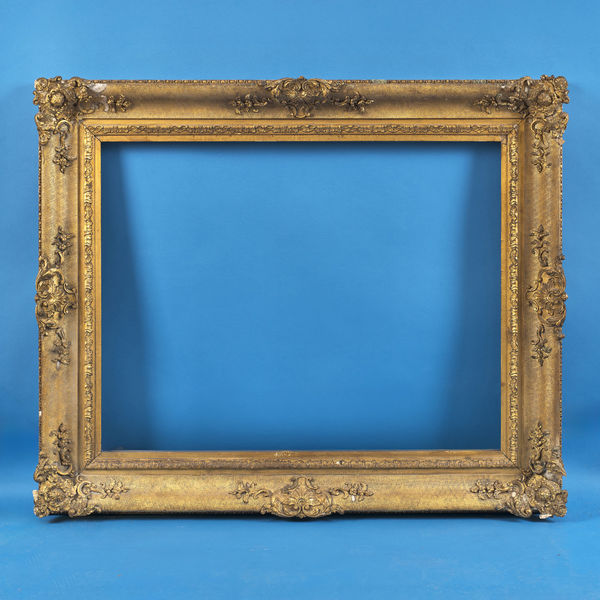 English corner and centre frame, 19th century gilt compo; straight sided; corners and centres on cross-hatched ground; acanthus inner edge and chain back edge rebate size: 28.5 x 36.5 inches sight size: 27.5 x 35.375 inches width: 5.5 inches