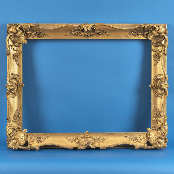 Scottish swept frame, first half of the 19th century maker's label for Thomas Baillie, 21 Postgate, Hamilton gilt compo swept; pierced corners, solid centres with swags; cross hatched ground; lambs tongue back edge; missing slip rebate size: 24.25 x 33 inches sight size: 23.625 x 32.5 inches width: 4.5 inches