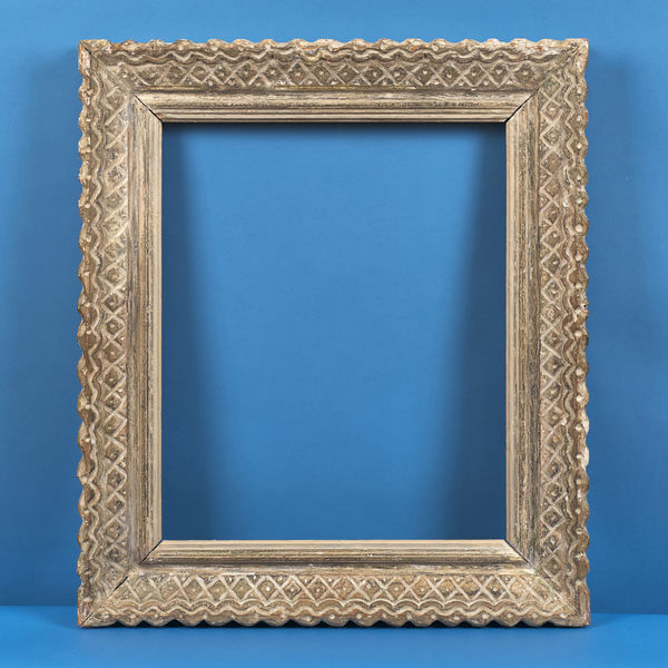 French Bouche frame, 20th century chip carved gesso and painted finish; typical Bouche surface pattern rebate size: 24.375 x 20.25 inches sight size: 23.625 x 19.5 inches width: 4.5 inches