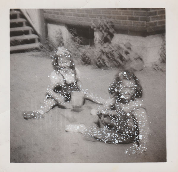 John Latour, Two blurry girls playing in the sand, 2025