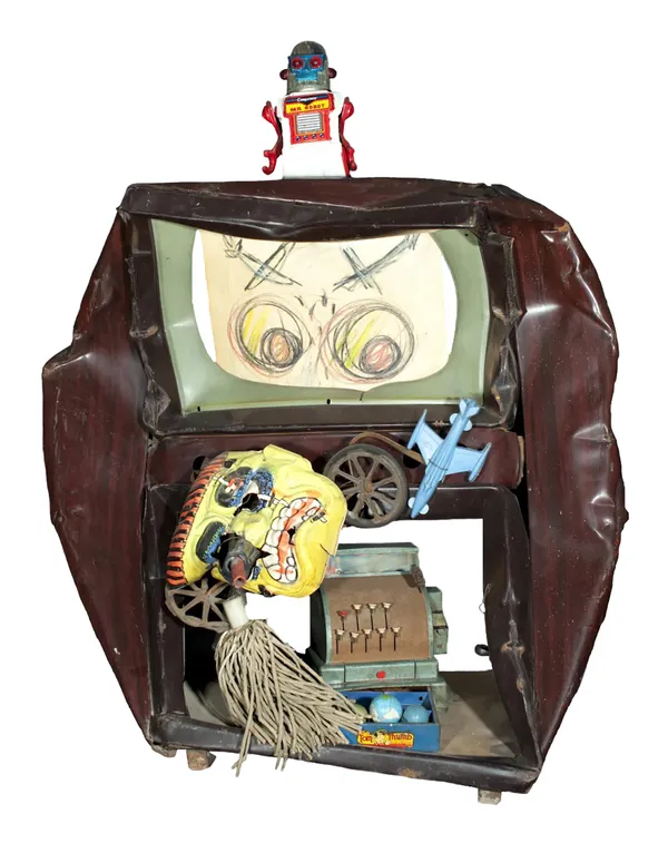 Assemblage sculpture by Sam Goodman comprising a television set and toys