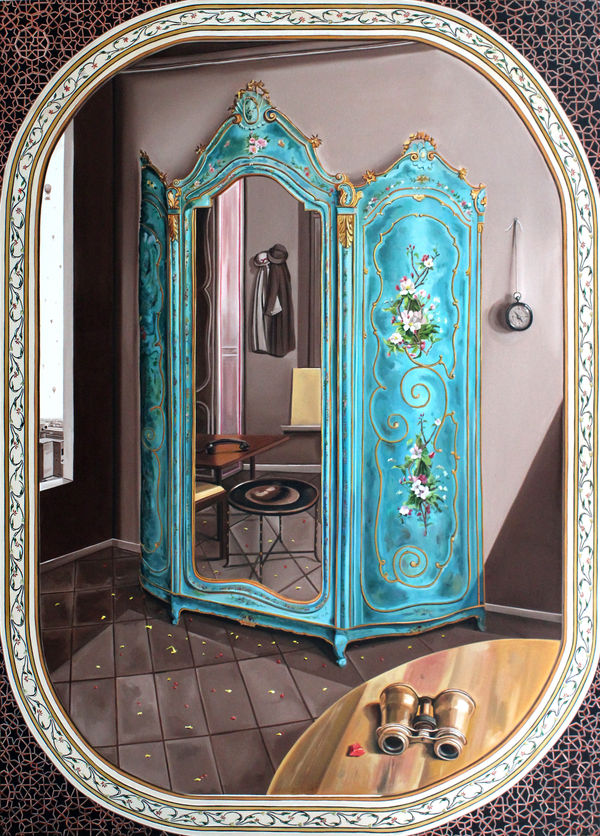 A blue coloured Victorian closet with a large mirror reflecting the interiors of a room