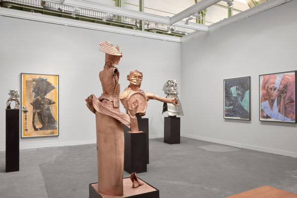 Matthew Monahan solo booth at FIAC filled with a variety of sculptures and paintings.