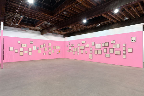Installation view of Andy Warhol's solo show, featuring 170 of the artist's drawings. A corner of the show, featuring more drawings.