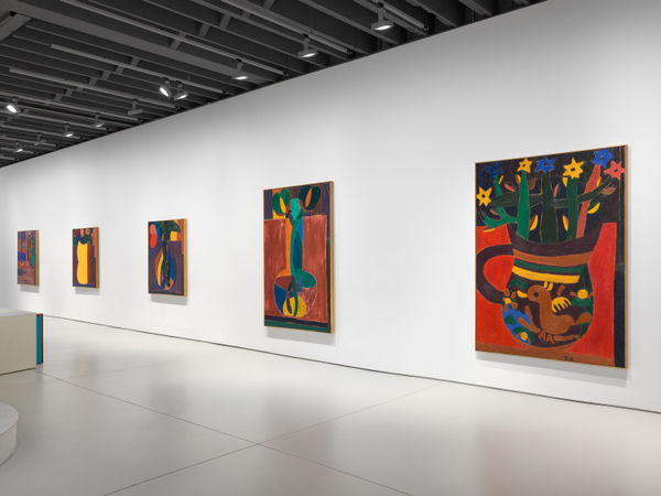 Installation view of Tal R's first exhibition with the gallery featuring paintings and sculptures.