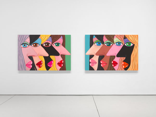 installation view of Brian Calvin's Waiting featuring paintings with hyperbolic color, mosaic eyes, and more. Two large-scale works featured.