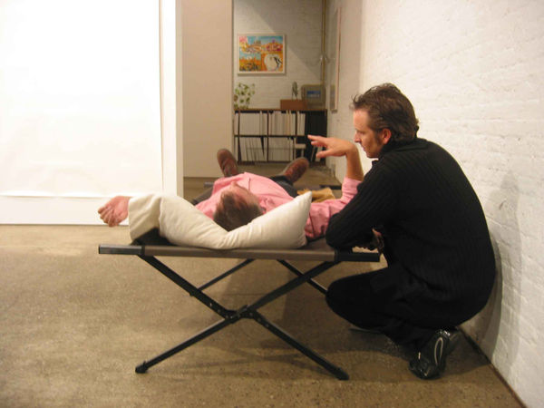 Installation view of Matt Mullican's One Night Performance featuring the artist "under-hypnosis." First, Mullican goes under during a hypnotherapy session.