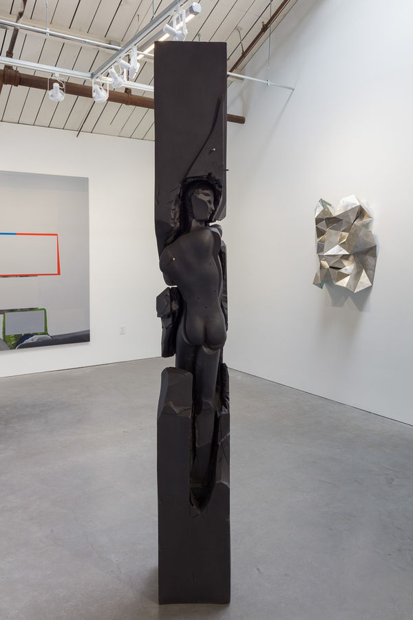 Installation view of the group show coordinated by Kreps and Kern Galleries, featuring many artists. Two Monahan sculptures with Havekost triptych in the background.