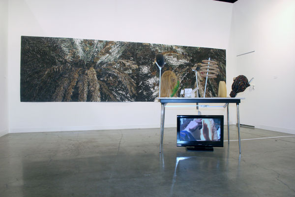 Installation view of the booth at Art Basel Miami 2008, featuring a segment of Odenbach's work.