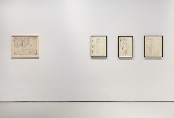 Installation view of Andy Warhol drawings from the 1950's. Three of Warhol's sketches can be seen here.