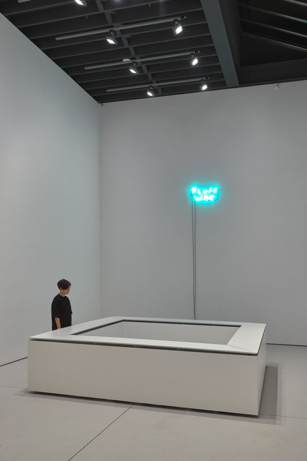 Installation view of David Shrigley's solo exhibition at the gallery with about 100 paintings and sculptures. Kinetic work "Fluff War" featured.