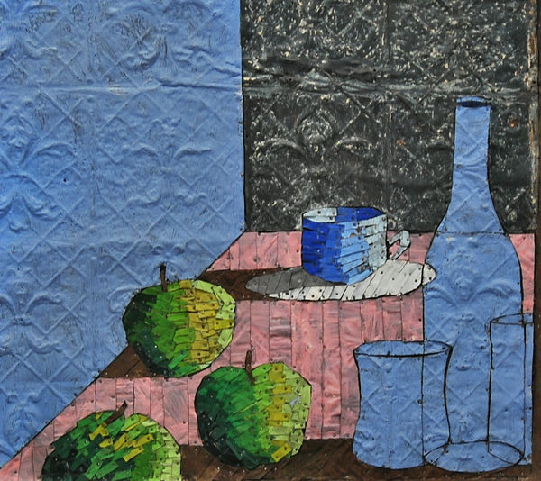 Detail of a Kobayashi mixed media piece made of tin and nails depicting a still life