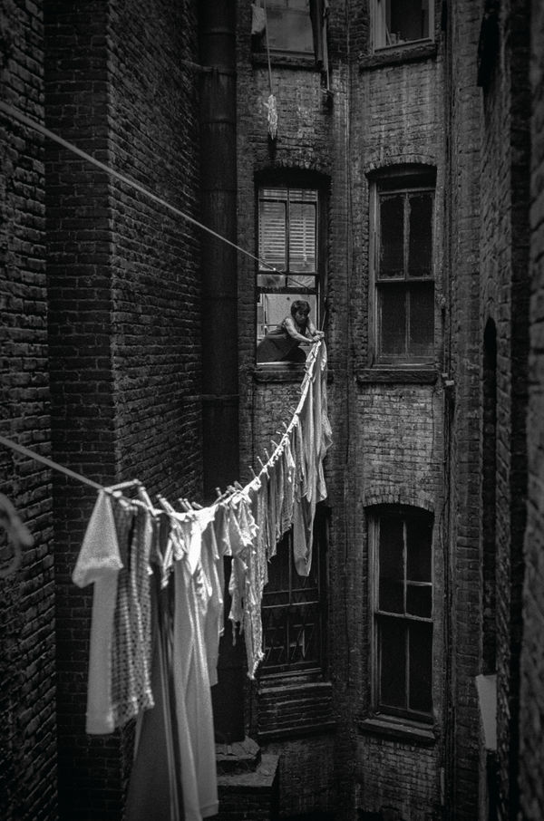 MICHAEL BENNETT Tenement, Lower East Side, New York, 1977 People Doing Things (1974 - onwards) 2022 C-Type Fuki Crystal Archive Paper 51 x 46 cm Limited Edition 1/10 £445