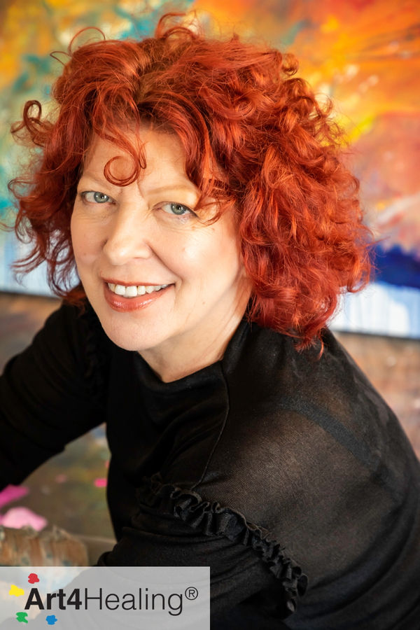 Contemporary abstract artist Clara Berta in her art studio featuring certified logo for Art4Healing workshops