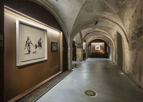 Banksy artworks hanging on wall