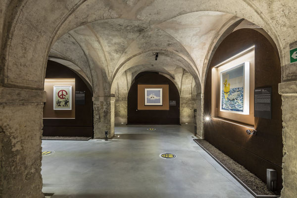 Banksy artworks hanging on wall