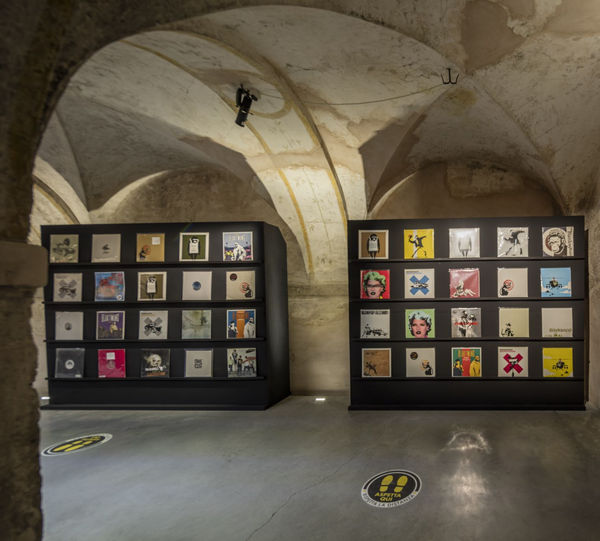 Banksy artworks hanging on wall