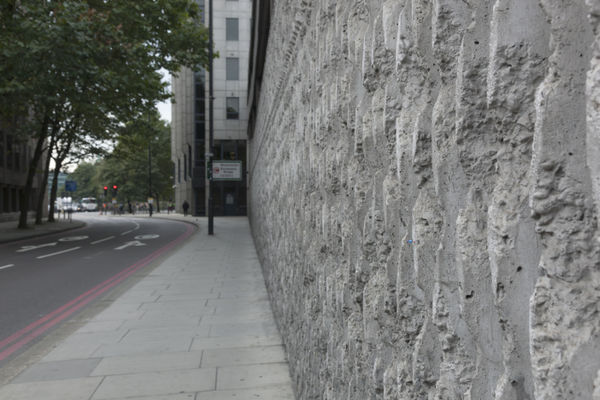 Slinkachu Alive context shot (wall)