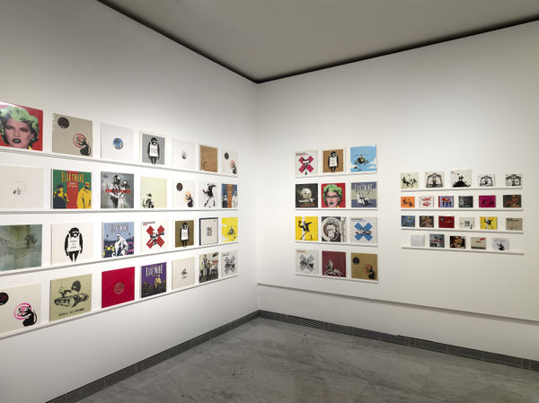 Banksy artworks hanging on wall