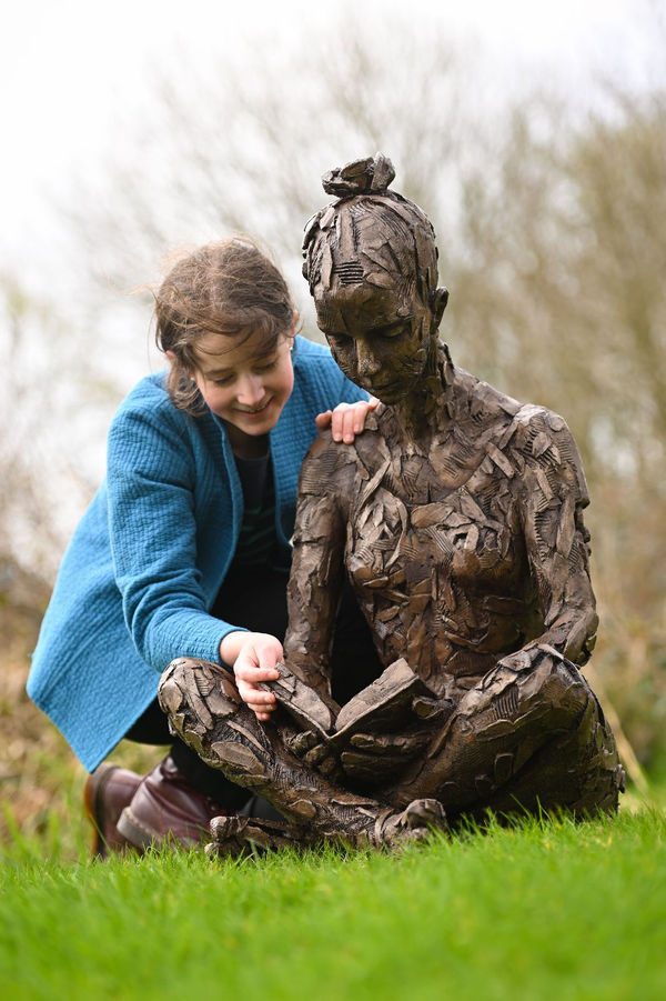 Sitting Reading by Carol Peace. Photo by Finnbarr Webster
