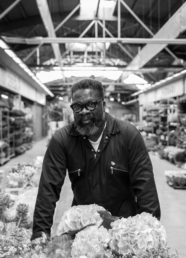 Artist Hugh Findletar at the flower market