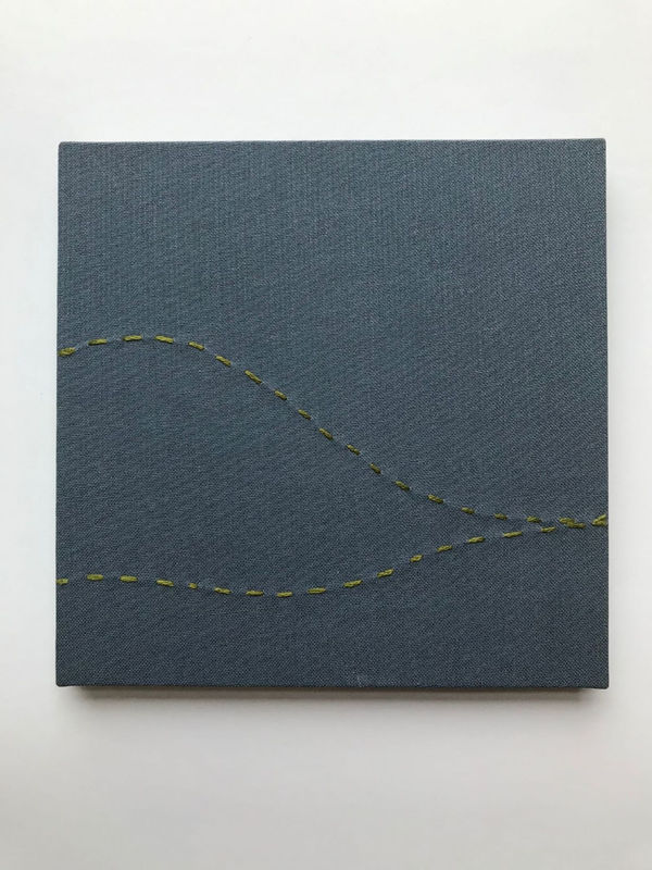 Handmade book in paper slip case showing images of the English Lake District