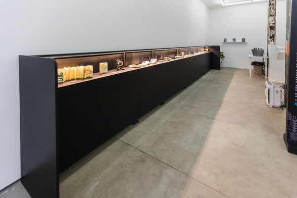 display case full of decorated moleskin notebooks