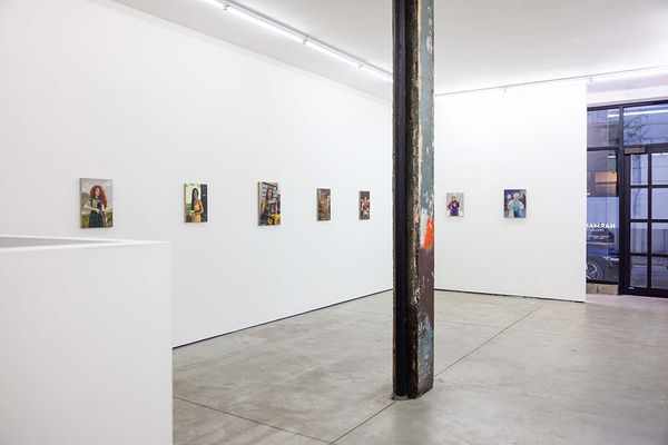 Photo of Matthew Grabelsky princess paintings hanging on white wall