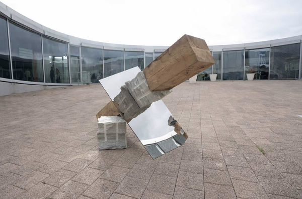 DRIFT #2, 2025, St-Léonard stone, oak, stainless steel, and polished mirror steel, 140 x 90 x 210 cm