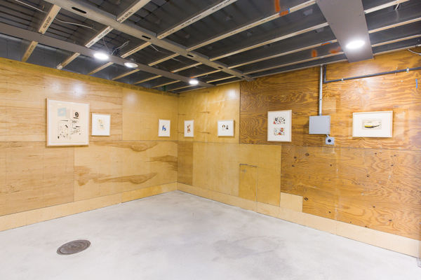 Installation view of NH DePass' exhibition at Sibyl Gallery titled Squiggle. The exhibition consists of roughly 40 framed drawings and one sculpture.