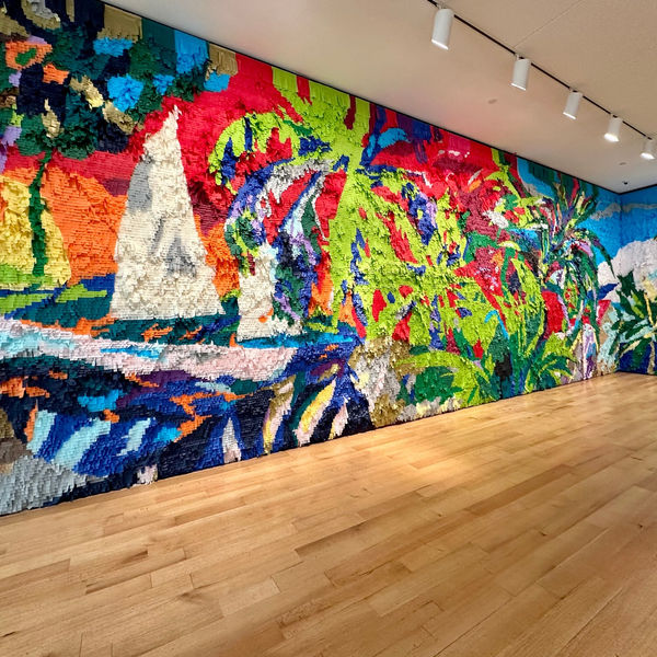 Justin Favela, CONERICOT, 2024, tissue paper and glue on wall. Photo courtesy the New Britain Museum of Art.