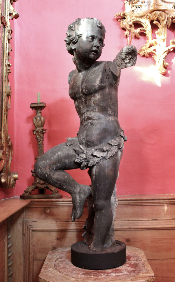 early 18th century carved oak putti