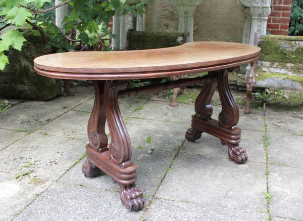 early 19th century carved mahogany kidney writing table