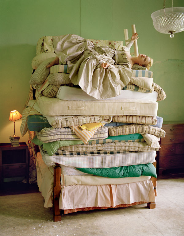 Tim Walker , Guinevere van Seenus, 20 mattresses and 1 hot water bottle, Fashion: Vivienne Westwood, Glemham Hall, Suffolk, England, 2006