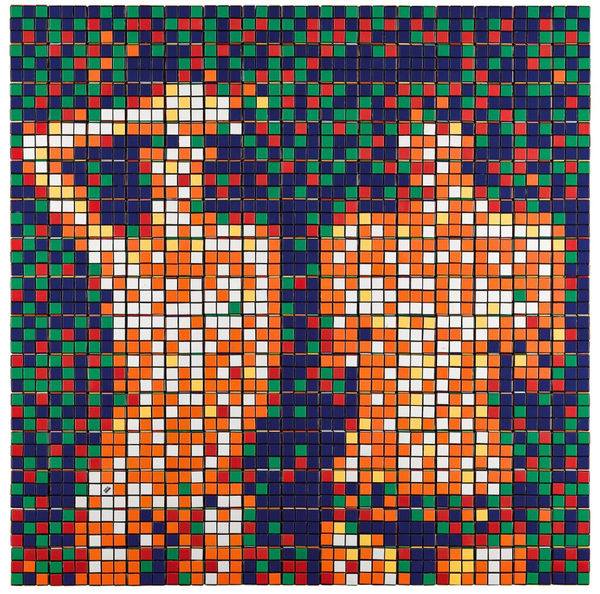 Invader artwork featuring pixelated figures in vibrant colors using Rubik's cubes