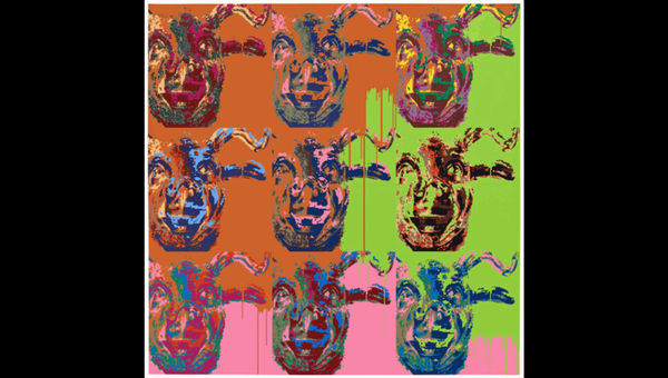 Andy Warhol artwork featuring colorful pop art cow heads in a grid pattern