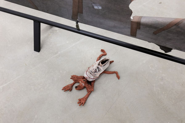 Wile E. Coyote Goes for a Walk (Right), 2019, shoe, spray-paint on clay, 14 x 44 x 28 cm