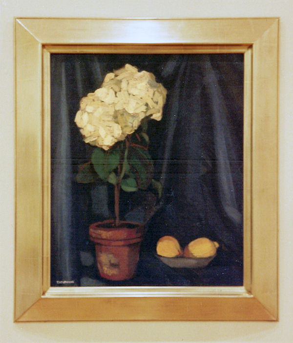 Still life painting of hortensias and lemons against a blue drape background