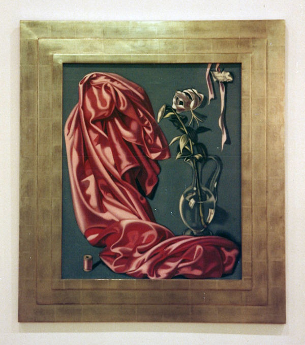 Still life painting of a red drape with flowers