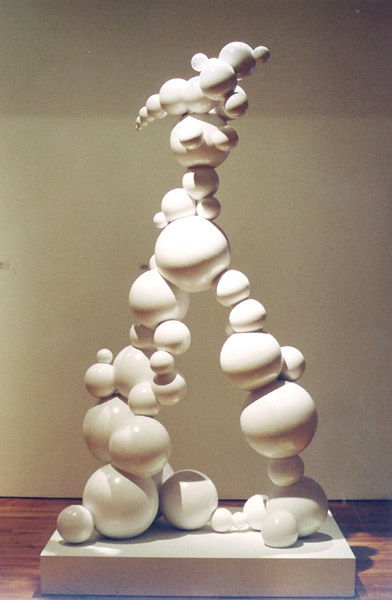 Sculpture of stacked white spheres