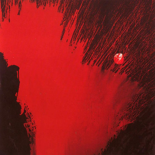 Red enamel on black background