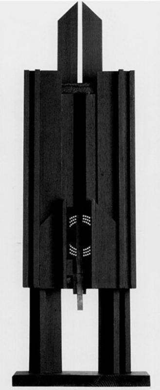 Black, wooden sculpture