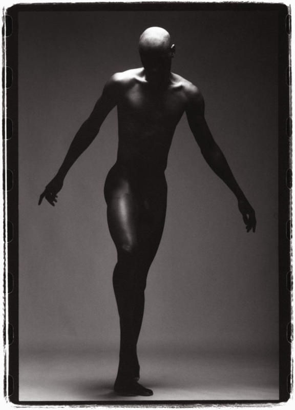 black and white photograph of nude performers