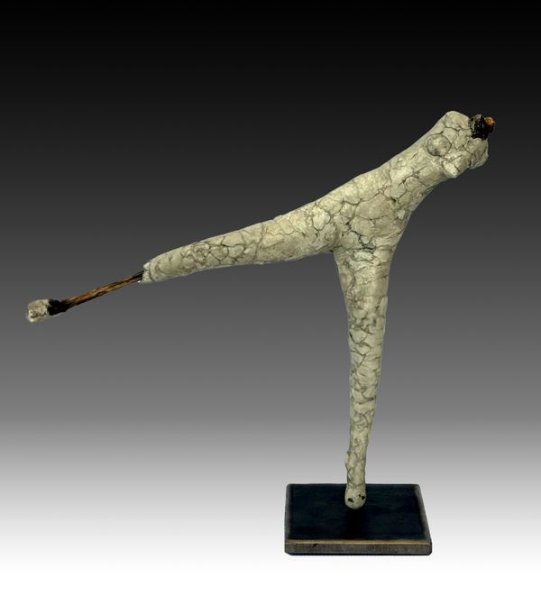 a sculpture of a figure