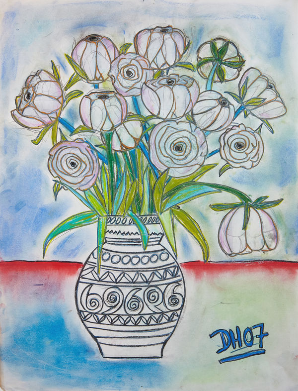 A vase of flowers on a colorful background