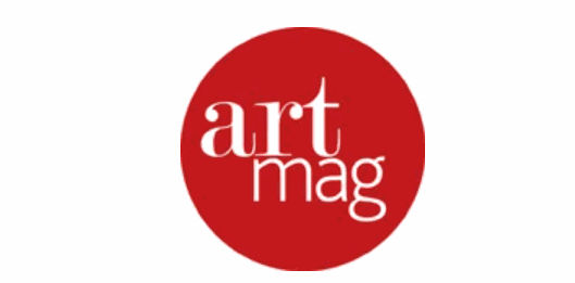 Logo of Art Mag in a red circle with white text.